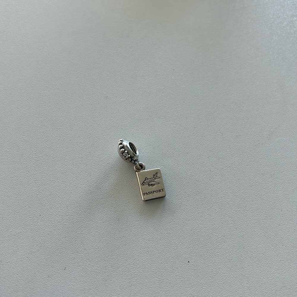 Pandora passport charm